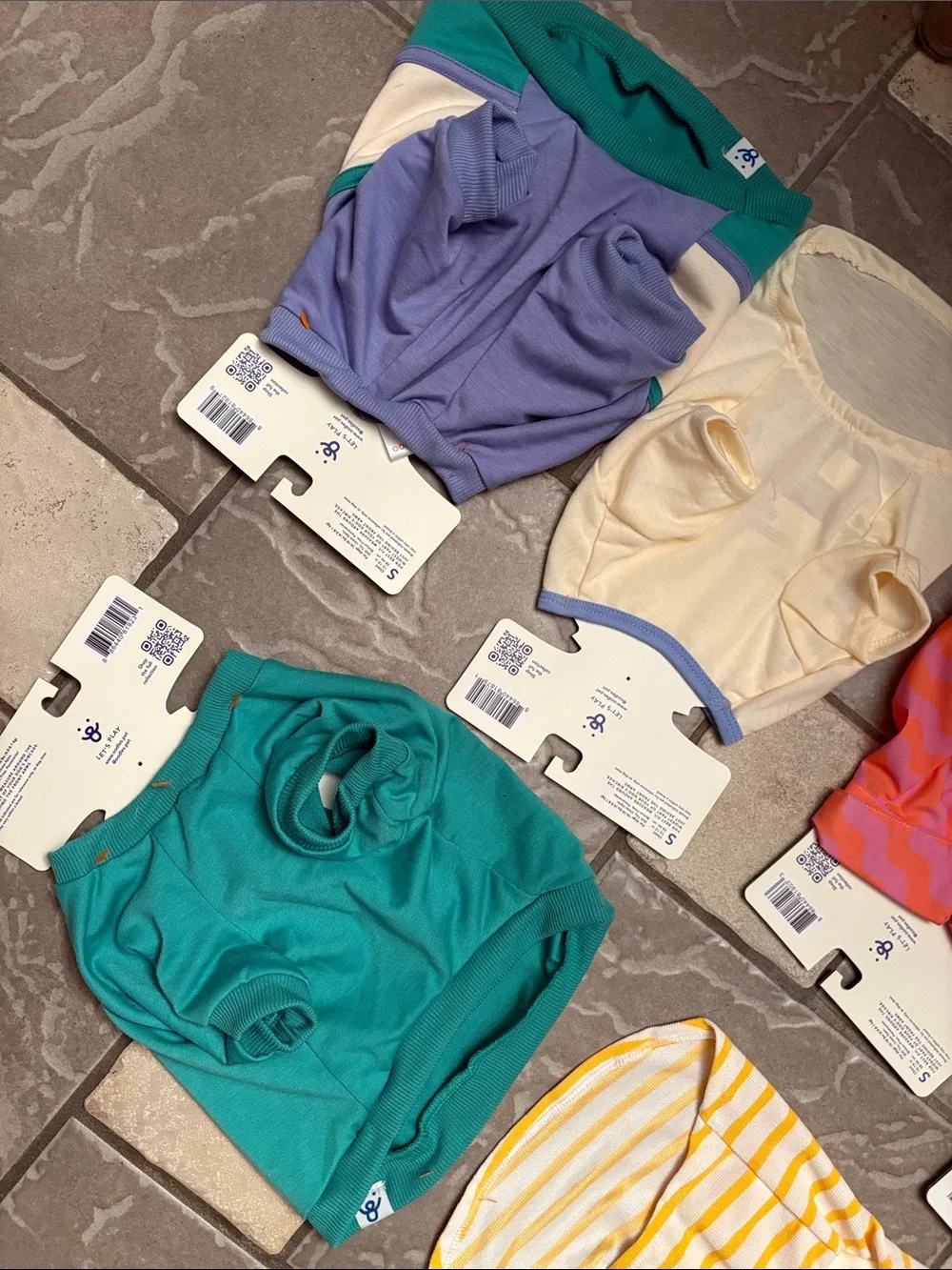 New lot six pieces of dog clothing, dog shirts size small fits 10 to 18 LBS